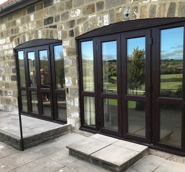 Photo of 2 sets of french doors by Elmhurst Windows